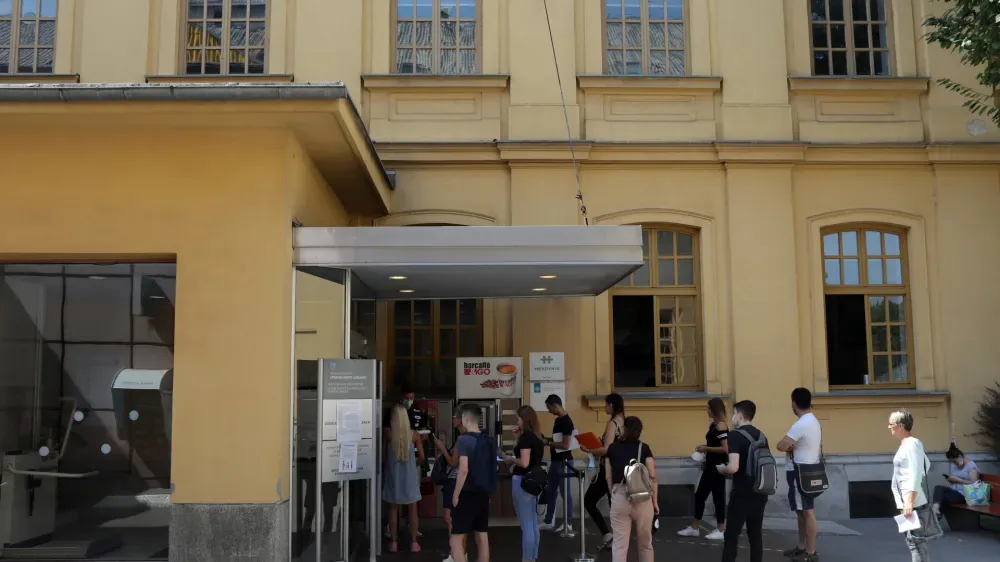 Students waiting in line at the administrative unit in Ljubljana.