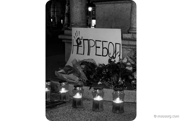 Candlelight and flowers at the memorial gathering in Ljubljana