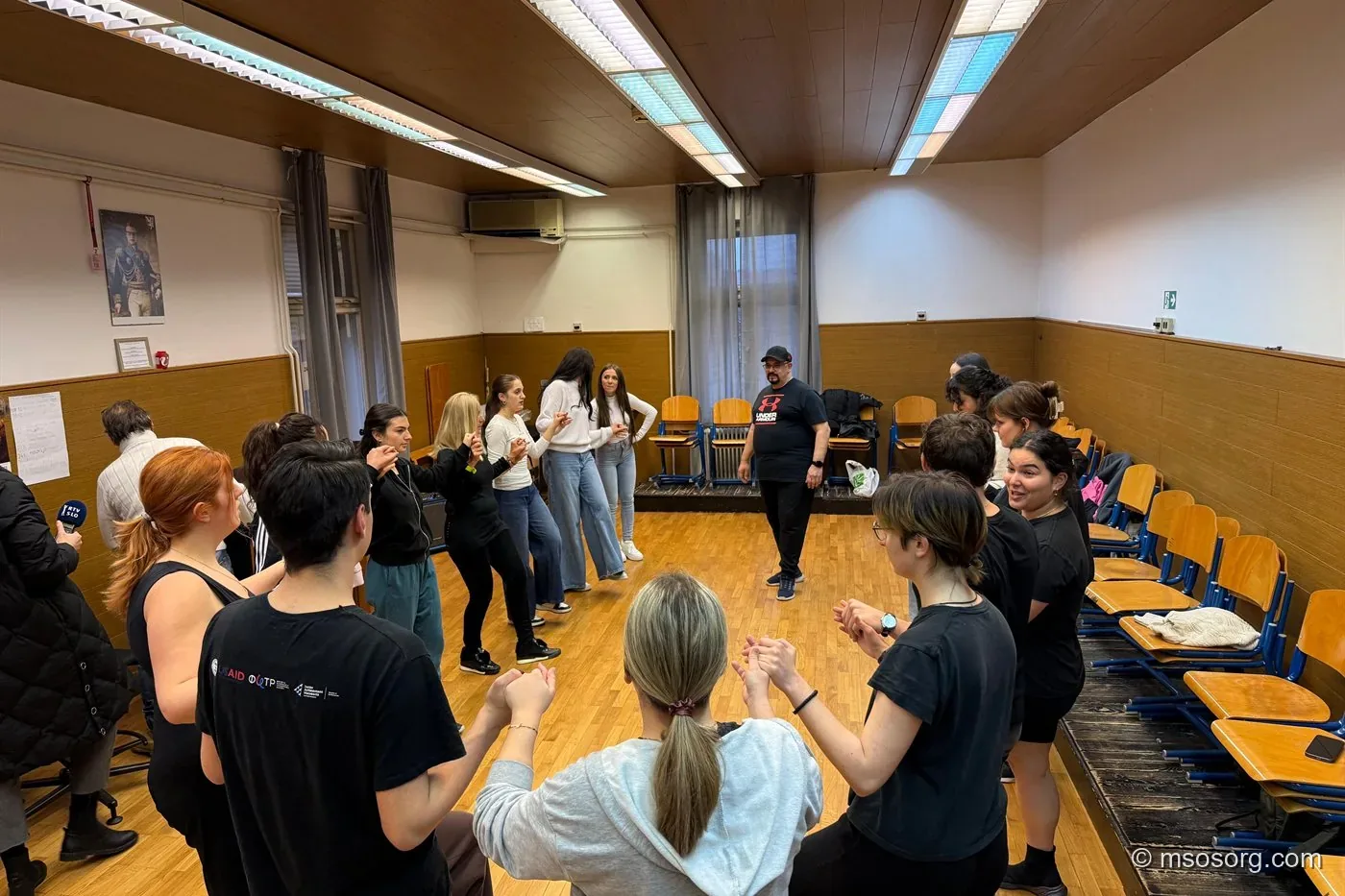 Macedonian students dancing together at an MSOS event in Slovenia