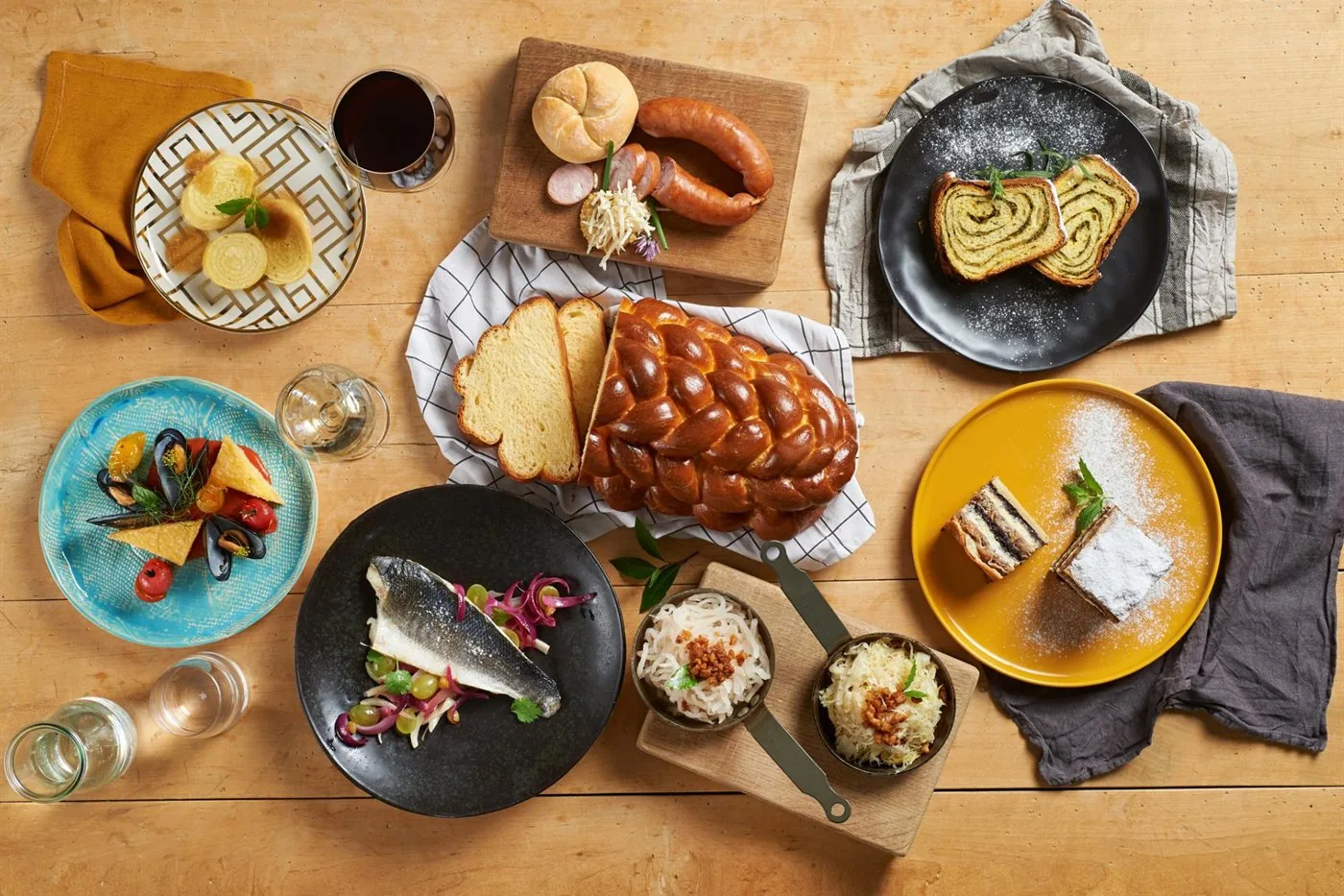 Several regional Slovenian dishes served together on a table